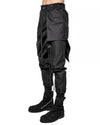 MINOAR - ASPECT LAYERED CONSTRUCT SKIRT TROUSERS, IN BLACK