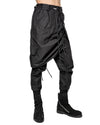MINOAR - ASPECT LAYERED CONSTRUCT SKIRT TROUSERS, IN BLACK