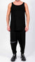 DAVID'S ROAD - Jersey drop crotch trousers with leather detail, in black